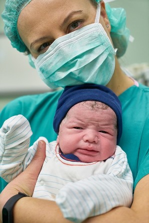 Northport Alabama LPN holding newborn